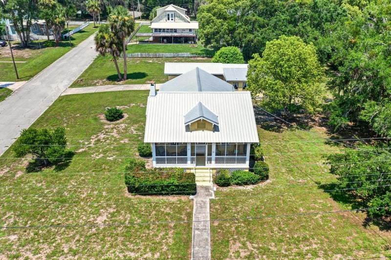 Drone front view of house and lawn at 101 N Lake St, Crescent City, FL