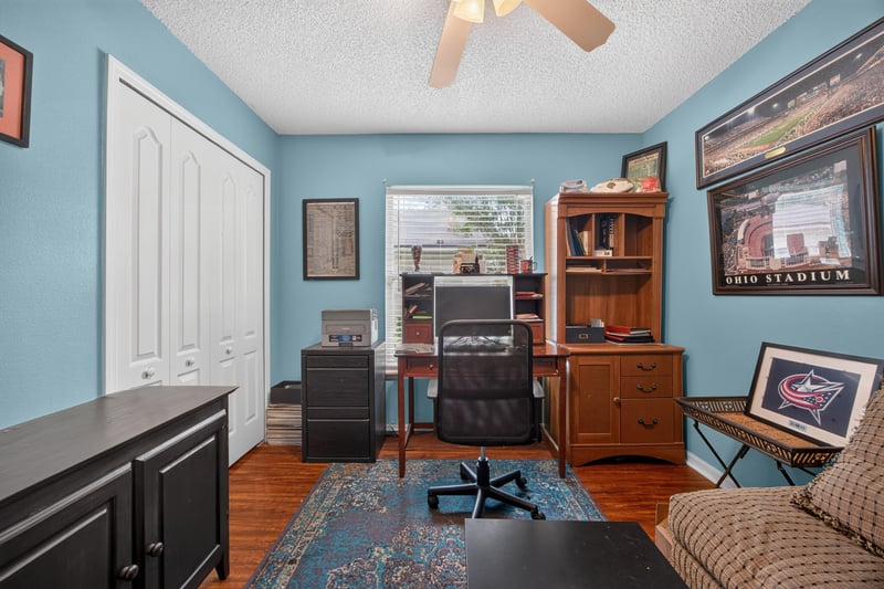 Bedroom office with entertainment center and futon at 145 Dover Bluff Dr, Orange Park, FL