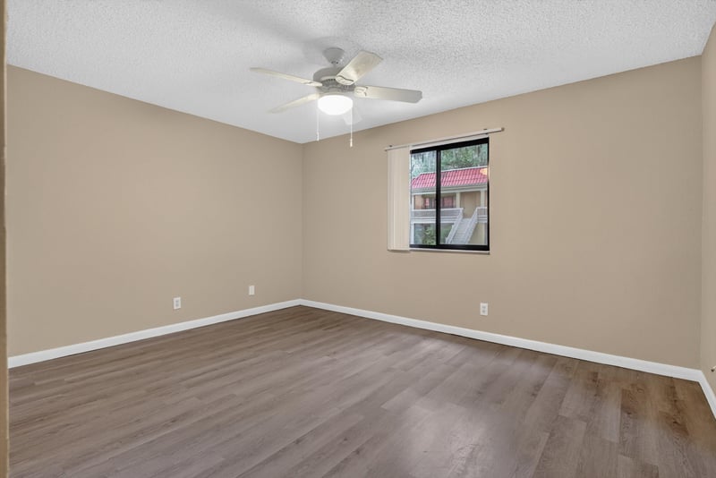 Empty bedroom with ceiling fan at 5811 Atlantic Blvd unit 47, Jacksonville, FL 32207