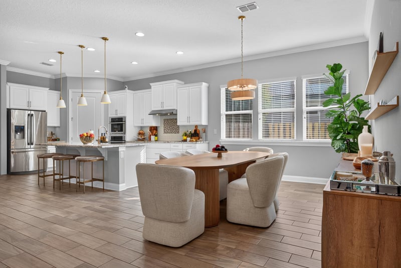 Dining area adjacent to the kitchen island at 3328 Southern Oaks Dr, Green Cove Springs, FL 32043
