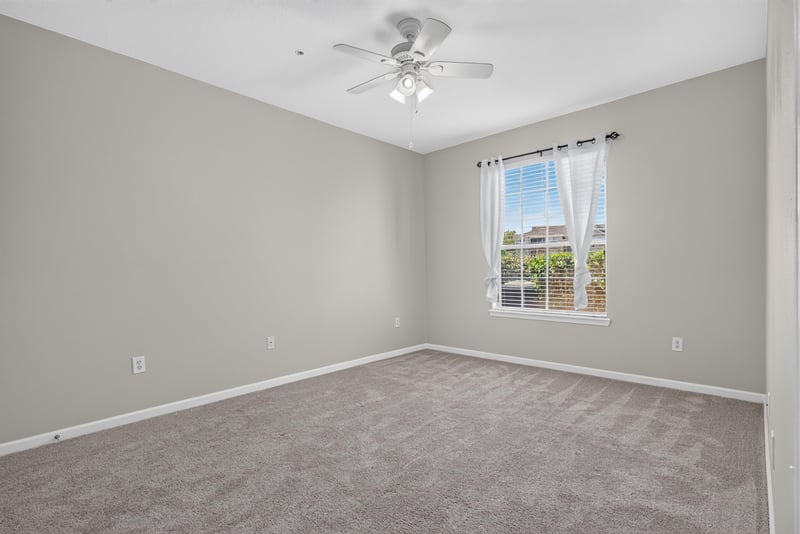 Bedroom with carpet and ceiling fan at 7990 Baymeadows Rd E #404, Jacksonville, FL 32256