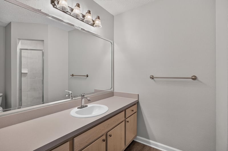 Bathroom with double sink vanity at 1701 The Greens Way 1415, Jacksonville Beach, FL 32250