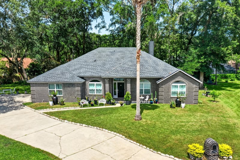 Aerial view of the roofline and front yard at 1346 Gately Ct, Jacksonville, FL 32225