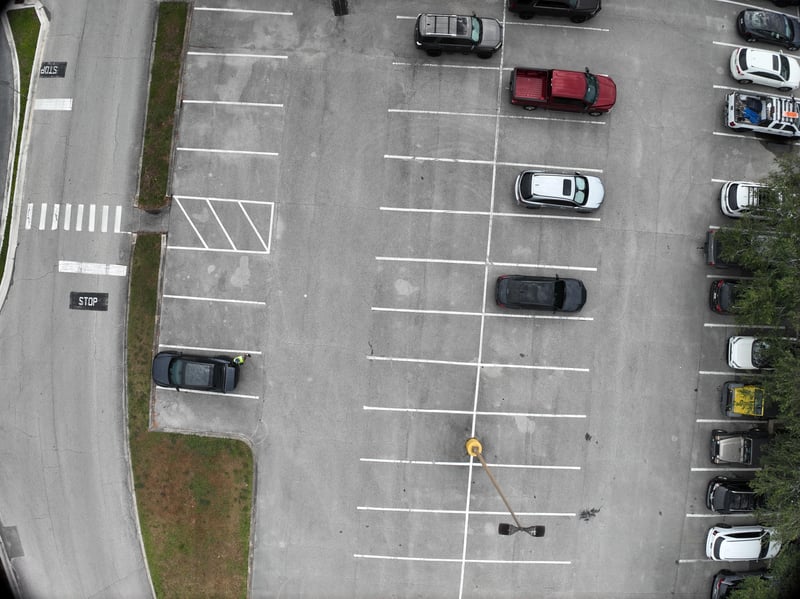 Aerial view of parking lot with cars at 9406 Atlantic Blvd, Jacksonville, FL 32225