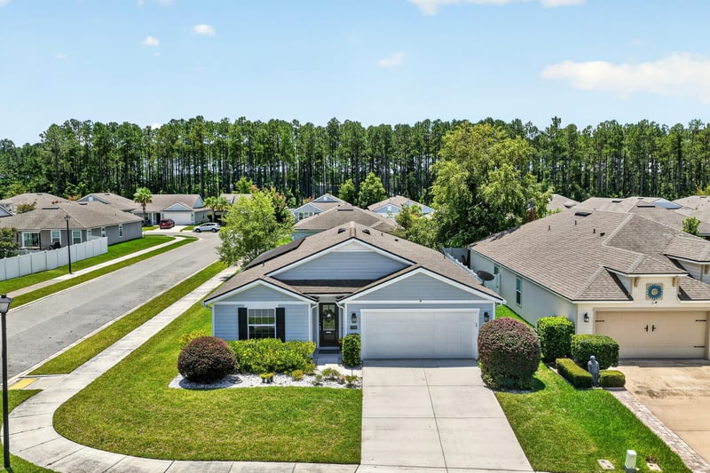 Aerial view of the street and home's roofline in Jacksonville, FL