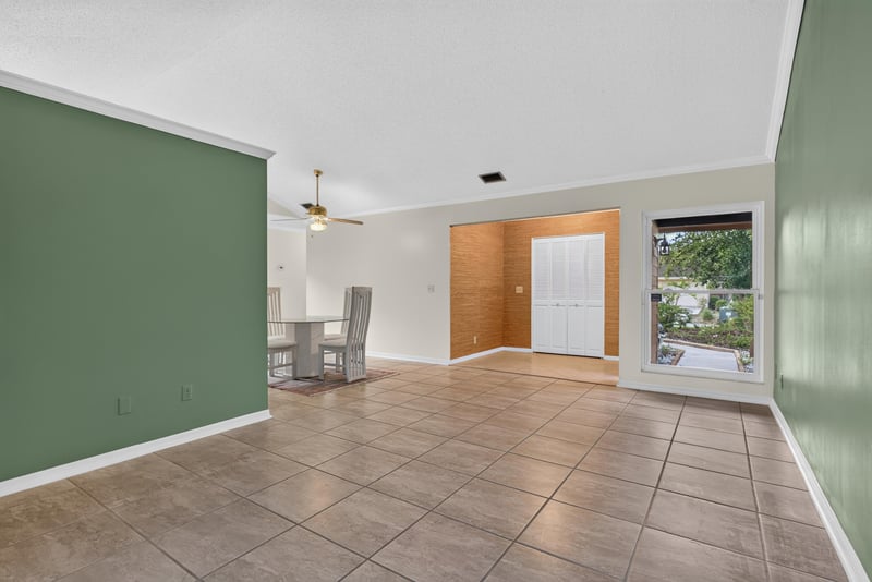 Living and dining area with tile flooring at 3515 Cormorant Branch Ct, Jacksonville, FL