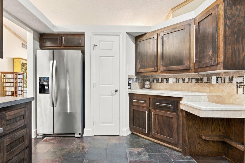 Kitchen counter and cabinetry, photographed by Megapixeler on Winding Springs Ct, Jacksonville