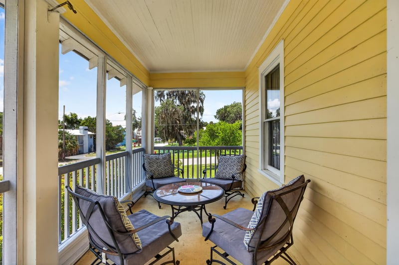 Porch view overlooking the front lawn at 101 N Lake St, Crescent City, FL