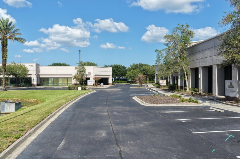 Building front with columned entrance at 10550 Deerwood Park Blvd, Jacksonville, FL 32256