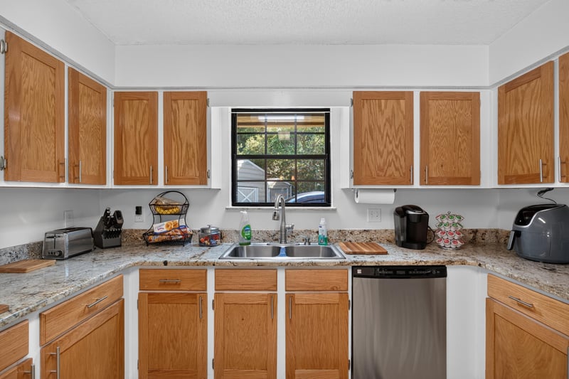 Kitchen counter with window over the sink at 2435 Range Line Rd, Middleburg, FL