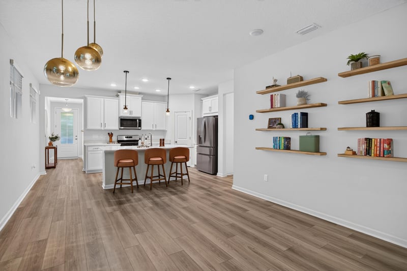 Open concept kitchen and living room at 93 Lochloosa Ct, St. Johns, FL 32259