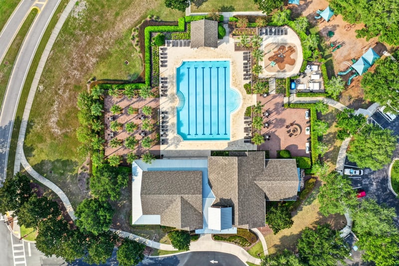 Drone view of home and community pool complex at 3101 E Banister Rd, St. Augustine, FL 32092