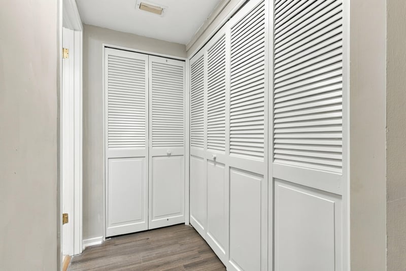 Closet with louvered doors at 7703 Las Palmas Way