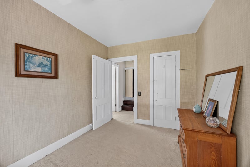 Unfurnished room with closet doors and mirror at 1173 US-17, Satsuma, FL 32189
