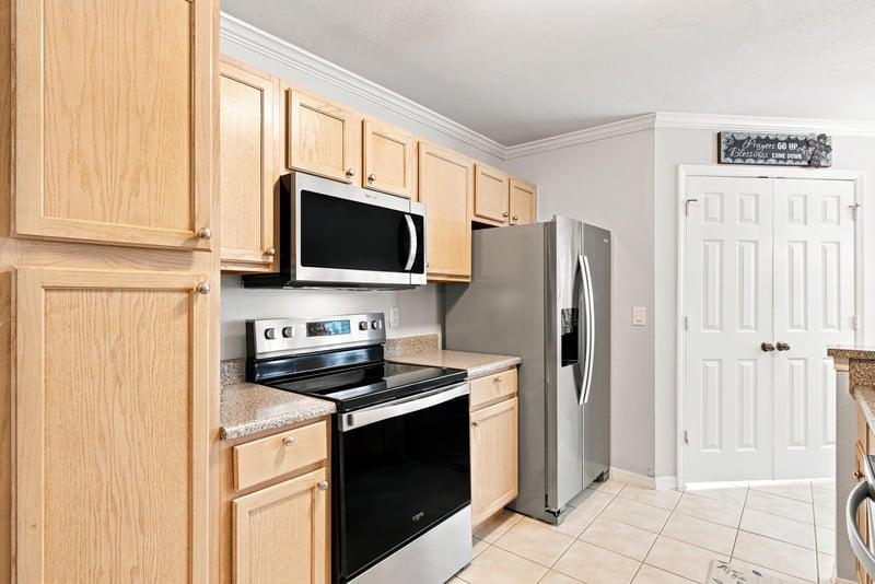 Kitchen view with microwave and range at 7800 Point Meadows Dr, Jacksonville, FL 32256