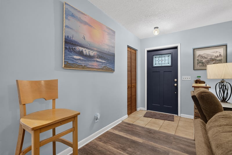 Entry area with front door and wall art at 3249 Maryland Ave, Green Cove Springs, FL