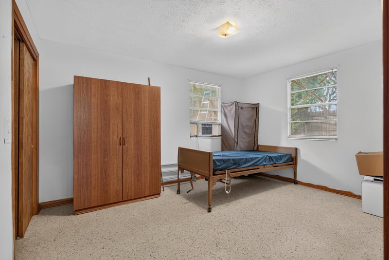 Room with closets and hospital-style bed at 5745 110th St, Jacksonville, FL 32244