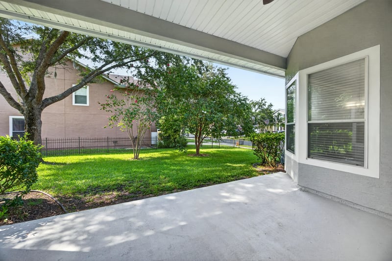 Covered lanai and backyard view at 3101 E Banister Rd, St. Augustine, FL 32092