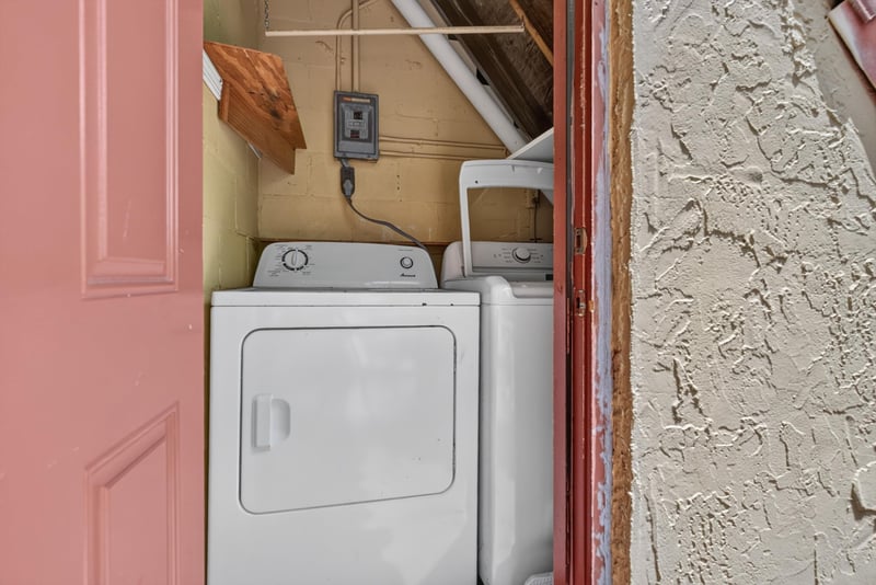 Stacked washer and dryer in closet nook at 3866 Campenero Ct unit 6, Jacksonville, FL 32217