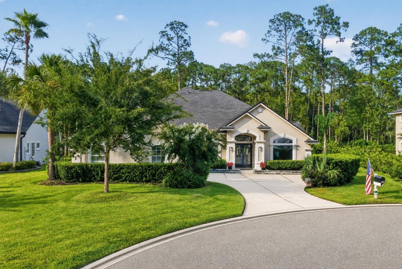 Aerial view of front driveway and trees at 2304 Spring Hill Ct, Orange Park, FL