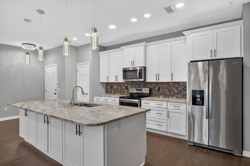 Kitchen with granite counters and stainless appliances at 11251 Campfield Dr unit 4209, Jacksonville, FL 32256