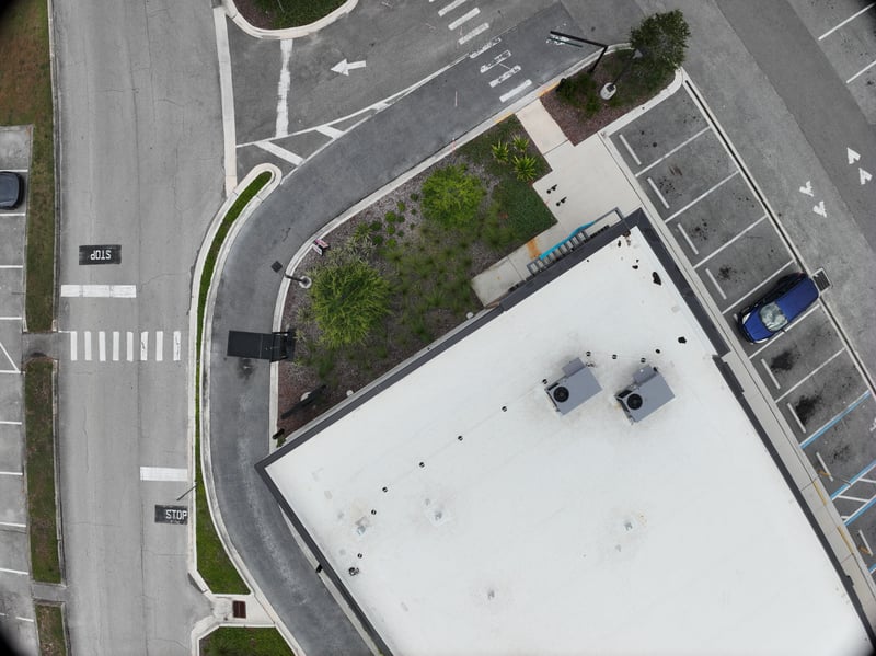Aerial view of rooftop and parking rows at 9406 Atlantic Blvd, Jacksonville, FL 32225