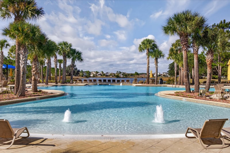 Community pool with fountains in Whisper Creek