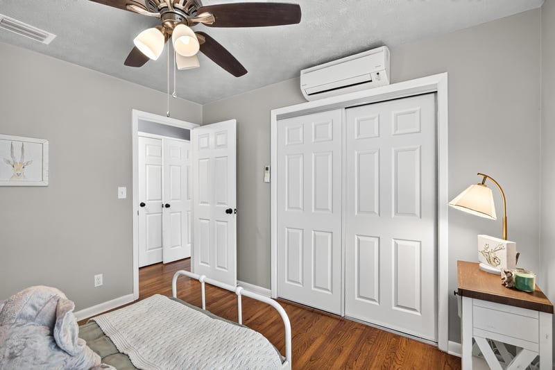 Bedroom closet with wall-mounted AC unit at 5843 Ovella Rd, Jacksonville, FL 32244