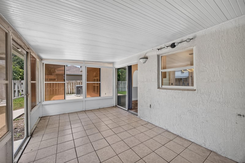 Screened porch overlooking backyard at 3428 Glenn Hollow Ct, Jacksonville, FL 32226