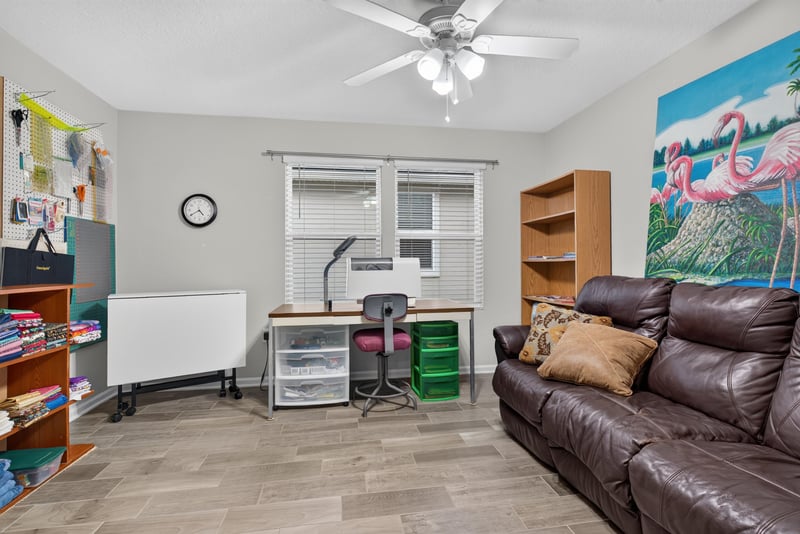 Office nook with desk and shelving at 4319 Green River Pl, Middleburg, FL 32068