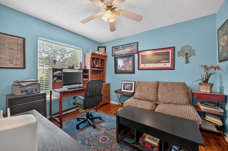 Bedroom office with desk and shelving at 145 Dover Bluff Dr, Orange Park, FL