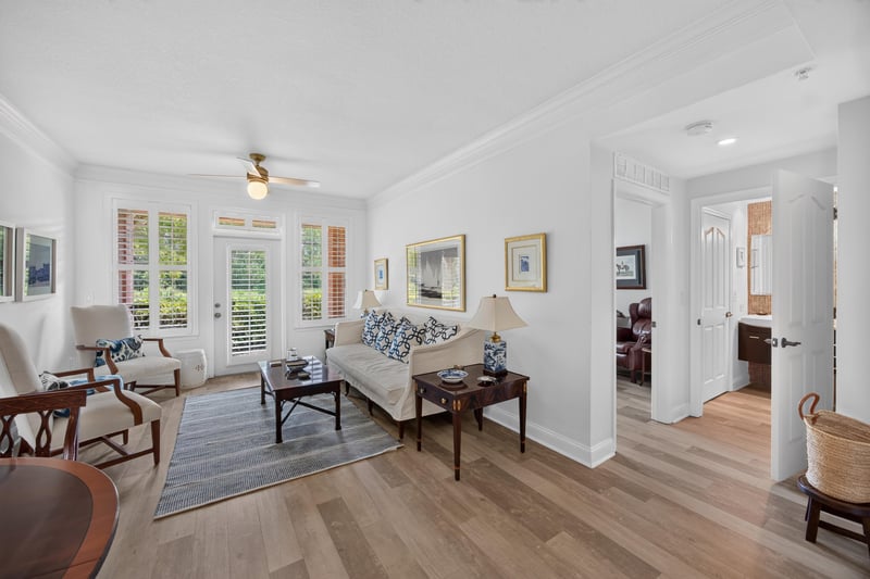 Living room with French doors to the porch at 10435 Mid Town Pkwy unit 135, Jacksonville, FL 32246