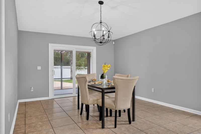 Dining area with sliding glass door at 706 Grampian Highlands Dr, St. Johns, FL 32259