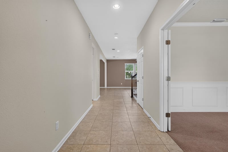 Entry foyer with tile flooring and hallway view at 263 Gilmore Ln, Orange Park, FL 32065