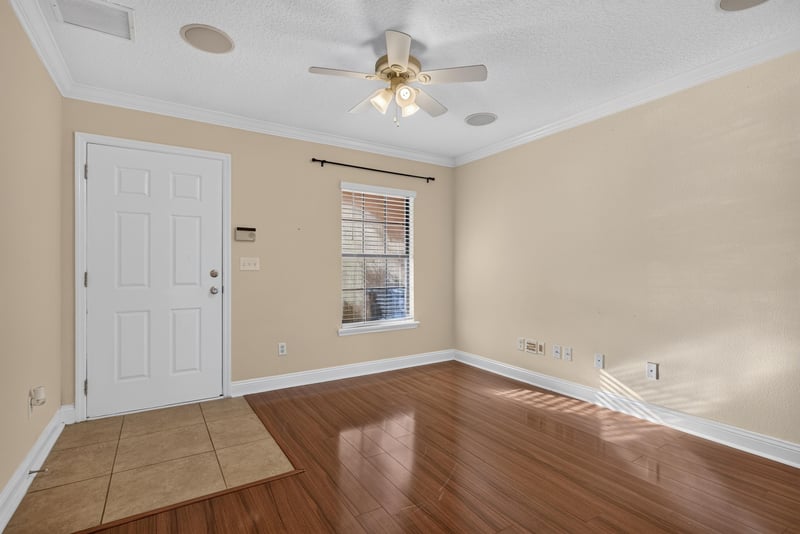 Entry area with tile and hardwood flooring at 353 Redwood Ln