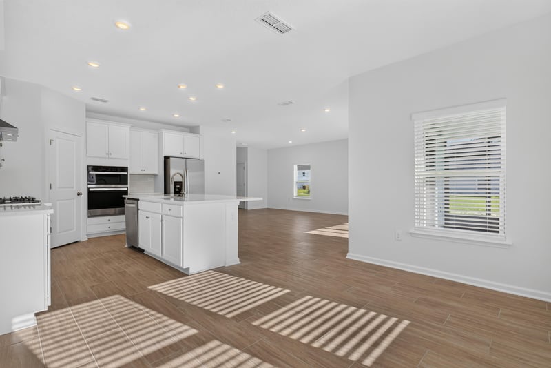 Kitchen island open to living room at 269 Bluegrass Wy, St. Augustine, FL 32092