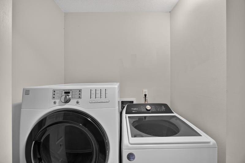 Laundry room with washer and dryer at 7723 Playschool Ln, Jacksonville, FL