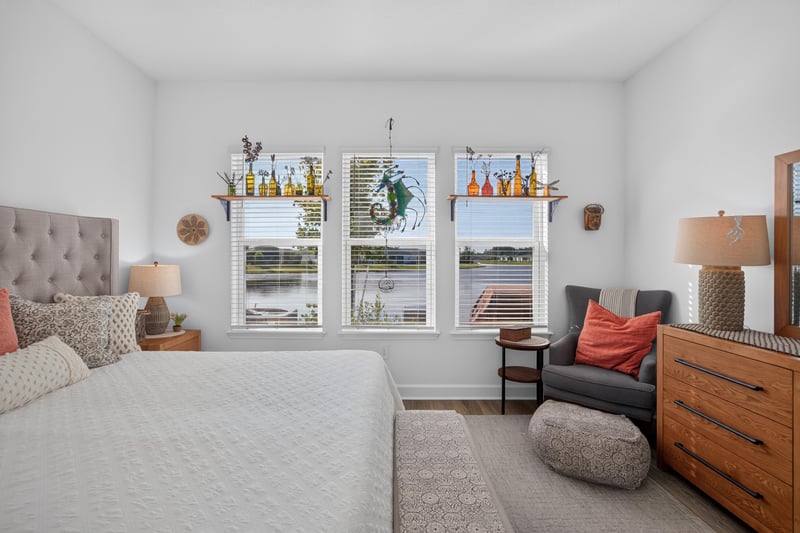Bedroom with dresser and natural light at 129 Amberwood Dr, St. Augustine, FL