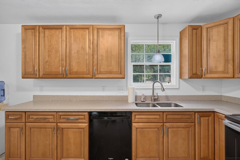 Kitchen with pendant light and window over sink at 1847 Grove Park Dr, Orange Park, FL