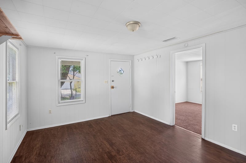 Dining area with windows and wood floors at 2372 2nd Ave, Jacksonville, FL 32208