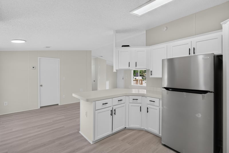 Kitchen with stainless refrigerator and counter at 7603 Coach Park Dr, Jacksonville, FL 32244