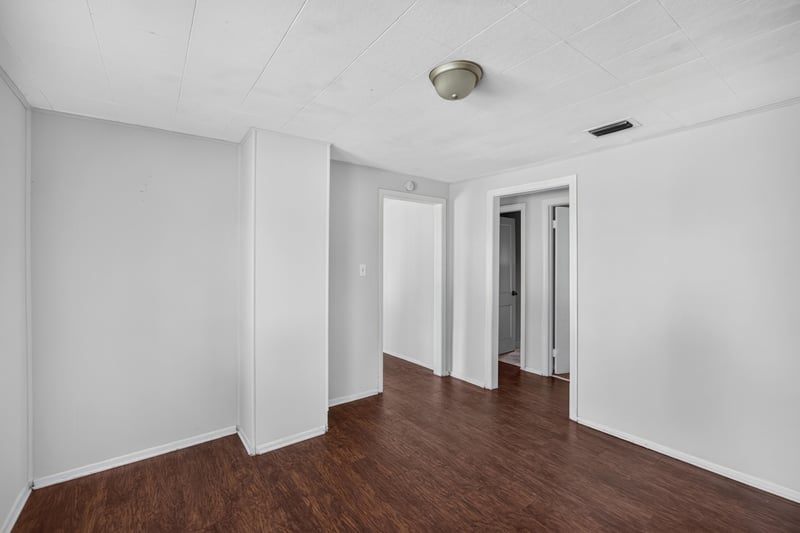 Hallway with wood floors and doorways at 2372 2nd Ave, Jacksonville, FL 32208