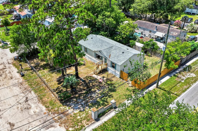 Aerial view of home and fenced yard at 7603 Coach Park Dr, Jacksonville, FL 32244