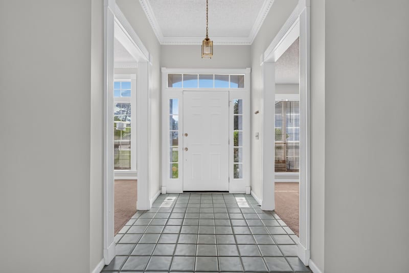 Foyer with tile flooring and glass front door at 400 Ashcroft Landing Dr, Jacksonville, FL 32225