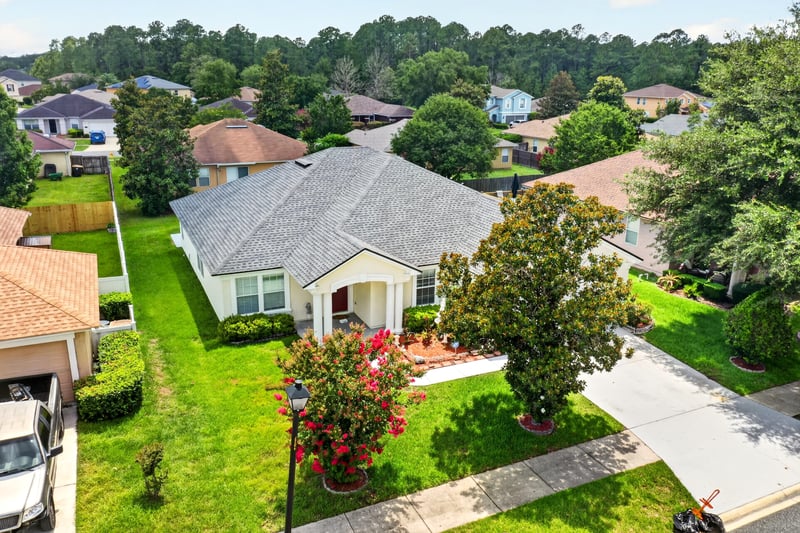 Aerial view of the home and surrounding neighborhood at 2282 Justin Lake Dr, Jacksonville, FL