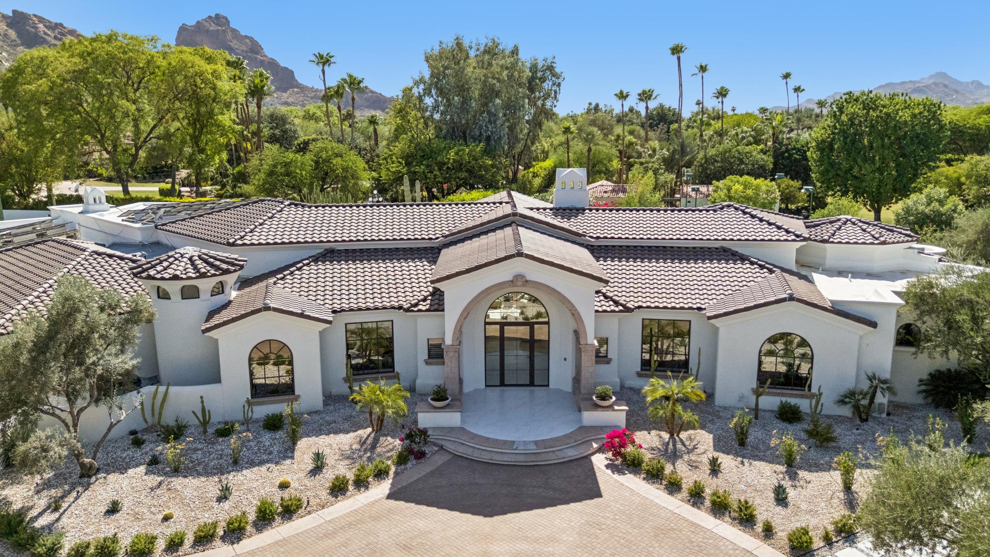 Arched front entry and paver motor court, Paradise Valley