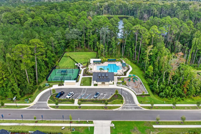 Aerial view of the community pool and tennis courts in Middleburg, FL