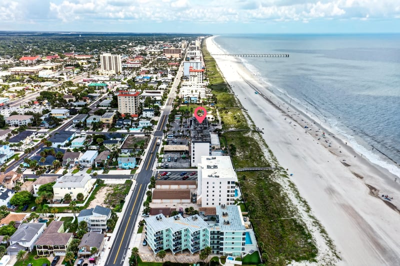 Aerial view of the pier and coastline in Jacksonville Beach