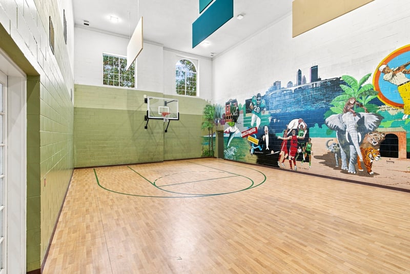 Indoor basketball court in Reserve at Point Meadows
