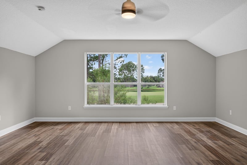 Bedroom with window view of the yard at 4109 Eagle Landing Pkwy, Orange Park, FL 32065